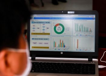 chuyen-doi-so-quan-7-fpt-vnexp